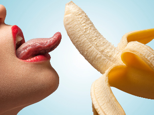 The girl licked the banana